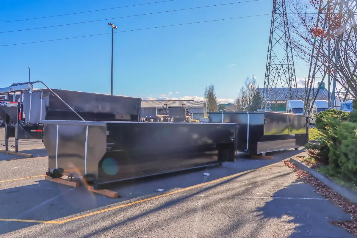 Roll-off dumpster ready for waste disposal at job site for 2 Yard Dumpster Rental in Watertown